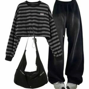 Y2K Grunge Outfit: Baggy Sweatpants, Striped Sweatshirt & Nylon Bag